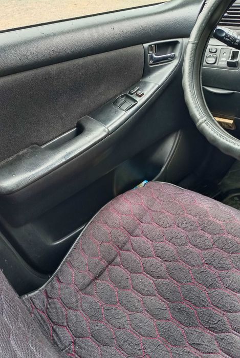 Toyota Corolla 2004 год