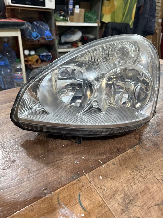 Фара приора 1 левая оригинал бош