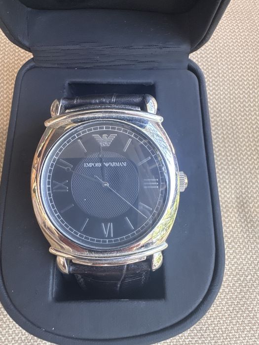 Citisen , tissot , armani