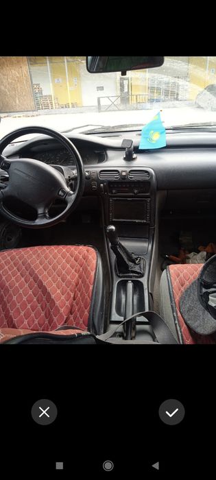 Мазда на ходу сиырға обмен