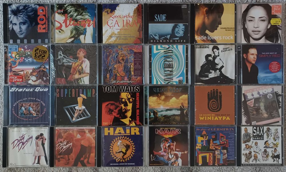 Cd-uri originale muzica Ac/Dc Beatles Guns n' Roses Metallica Michael Jackson Pink Floyd Queen Roger Waters Yello