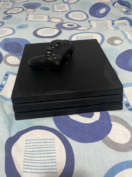 Ps 4 pro plus un joc la alegere