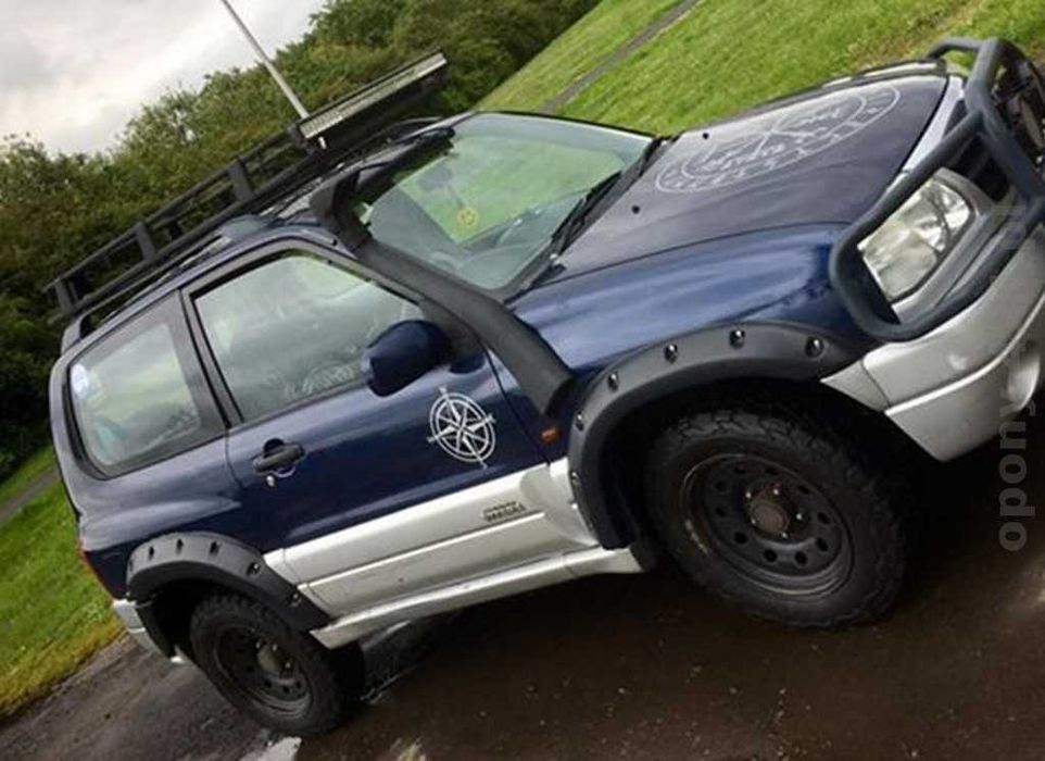 OVERFENDERE Suzuki GRAND Vitara 3 usi - 8 cm + kit garnituri/suruburi