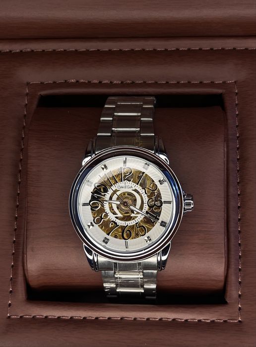 Мезанический наручные часы