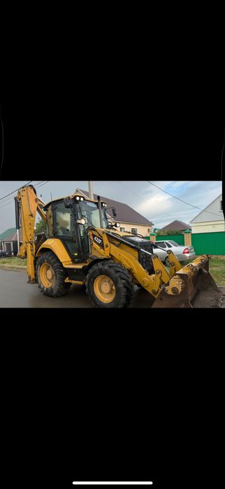 Услуги экскаватора-погрузчика