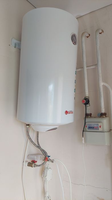 Радиатор, водонагреватель, стойка б/у