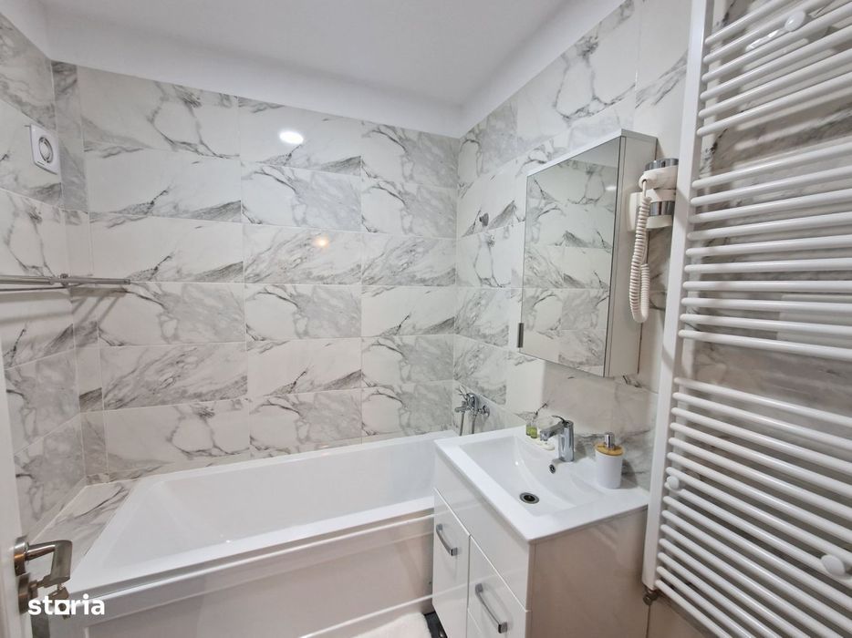 Apartament 74 mp, 2 bai, mobilat complet la 1.547 €/mp. Te muti d