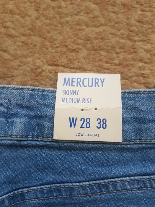 Джинсы новые голубые