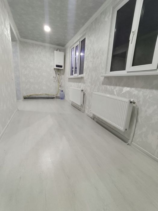 2/4/4 Kvartira 58 kv Chirchiq shaxar Troysikiy 14-maktab oldida