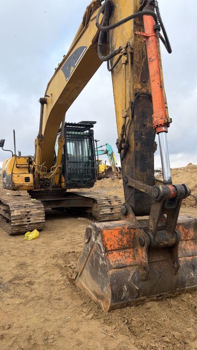 Аренда Экскаватор Cat 320