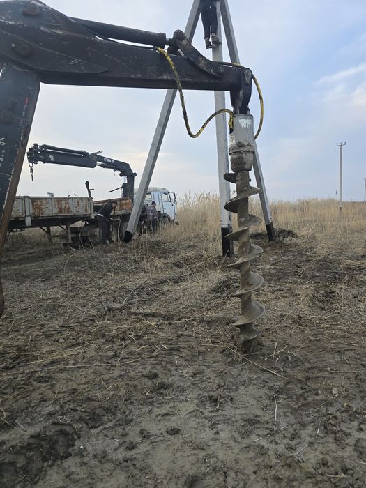 Экскаватор погрузчик ямобур