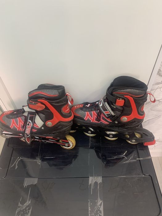 Роликовые коньки