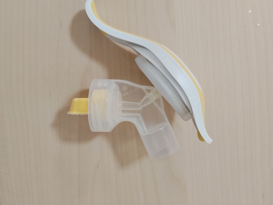 Електрическа помпа Medela swing flex + ръчна помпа Medela