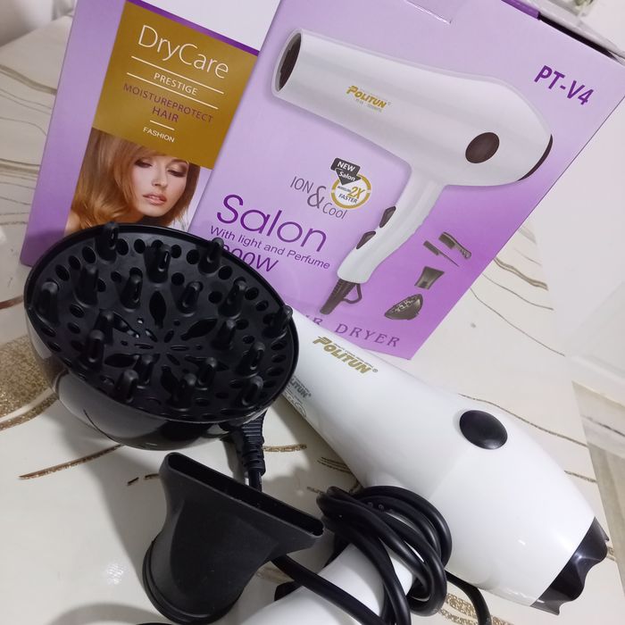 Продаю фен новый с насадками