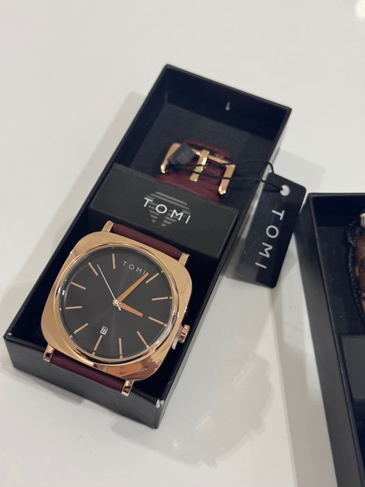 Фирменные часы Tomi