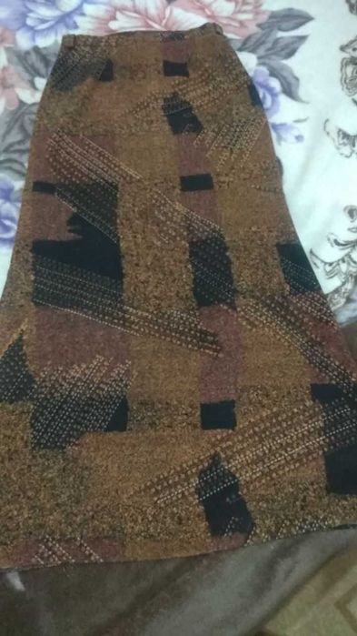 Кофточки,  брюки, юбки, шапки ремни