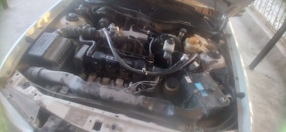 Нексия  2006год сонс