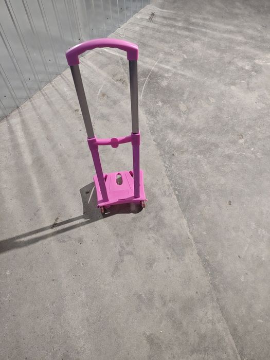 Vând adaptor troler roz  pentru ghiozdan