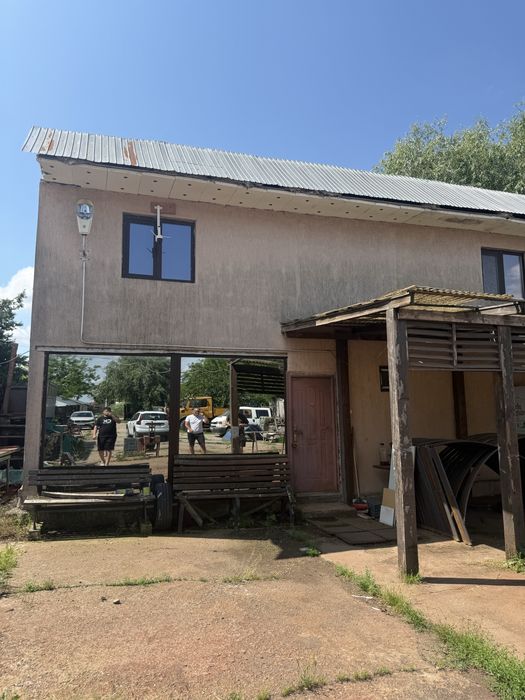 – Proprietate industrială/comercială cu locuință, teren 2.180 mp Ceacu