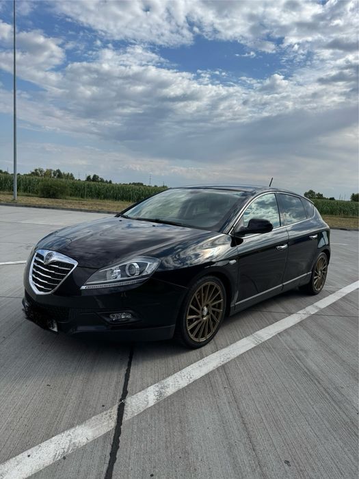 Lancia Delta 1.4 Turbo benzină 140 CP, an 2014 – stare foarte bună, bine întreținută și bine echipată