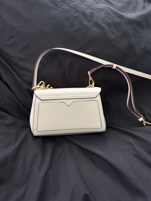 женская сумка Michael Kors.