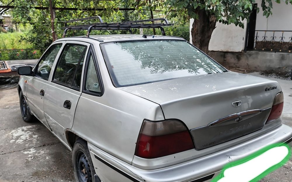 Nexia 1 yili 2004 xolati yaxshi