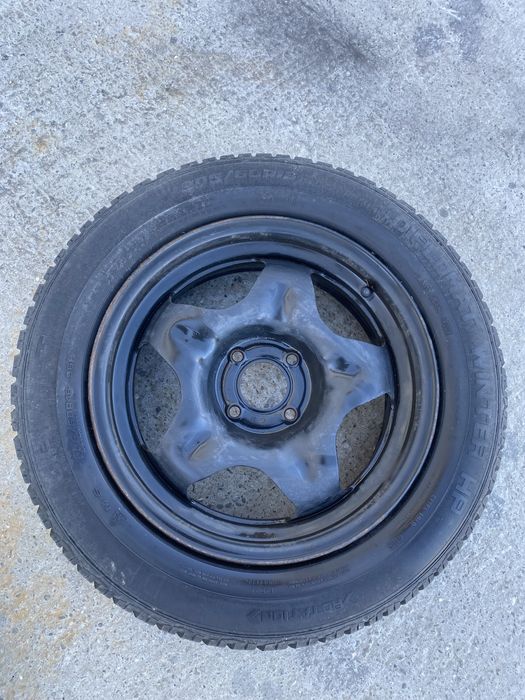 Jante tabla Opel Crossland  4x108 cu capace originale anvelope 205 / 60 / 16 M+S in stare foarte buna