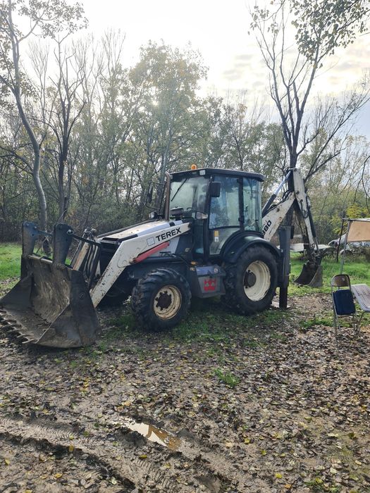 Услуги с комбиниран багер