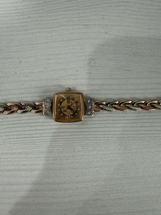 Золотые часы.