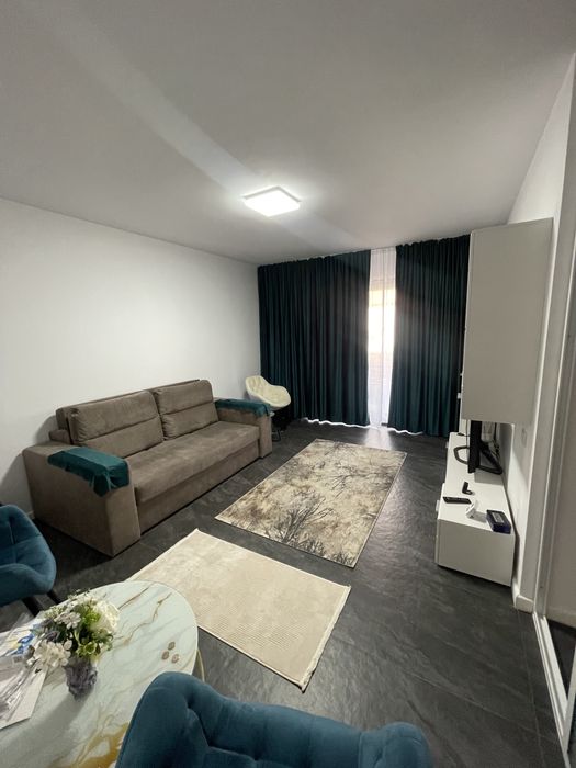 Garsoniera si loc de parcare si curte