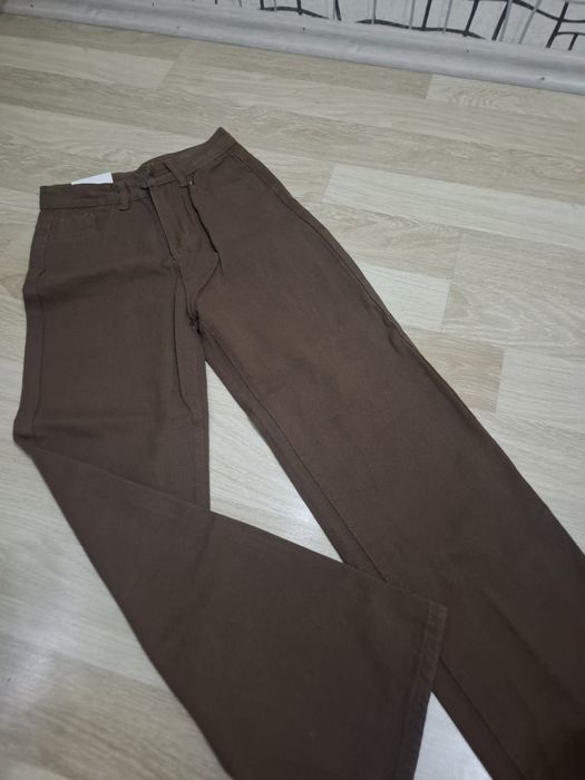 Коричневые джинсы,новые
