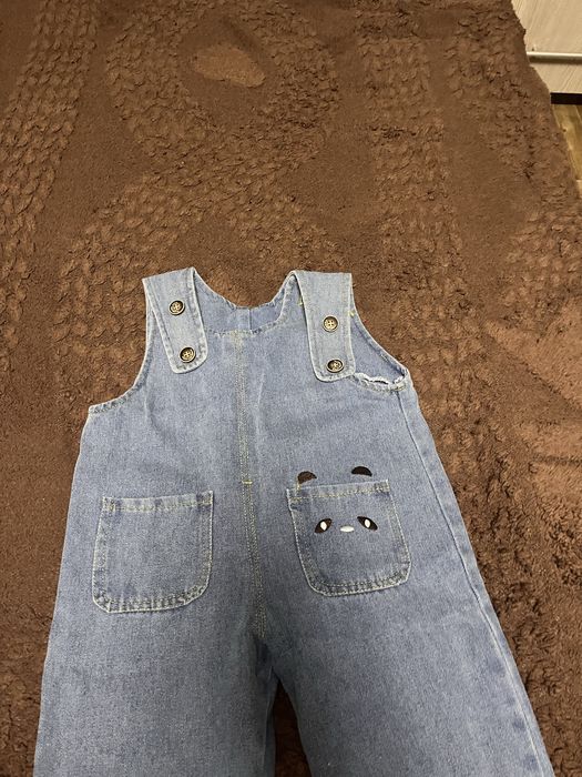 Продам джинсовый комбинезон