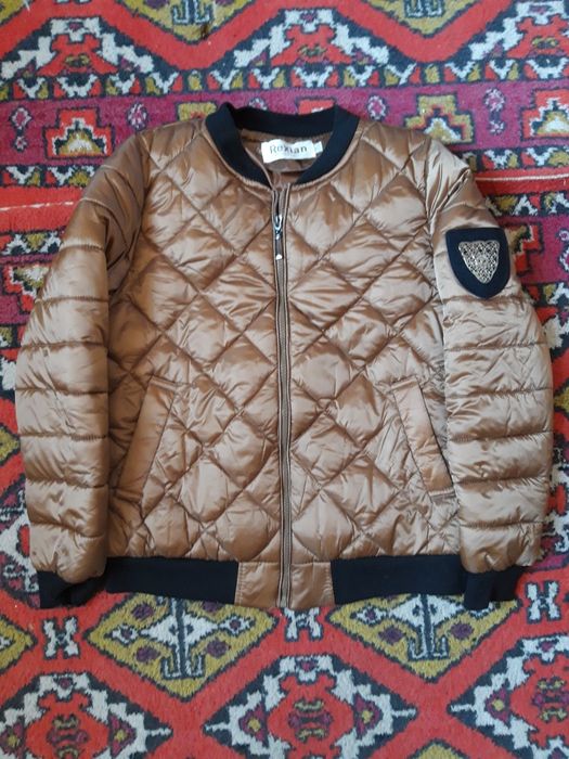 Куртка женская. Новая. Размер 42-44. Бронзового цвета