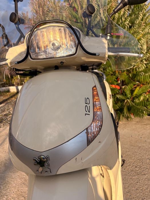 Scuter Peugeot Tweet 125 cc se conduce cu B  recent adus !