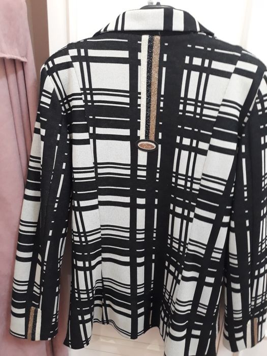 Елегантно сако на луци