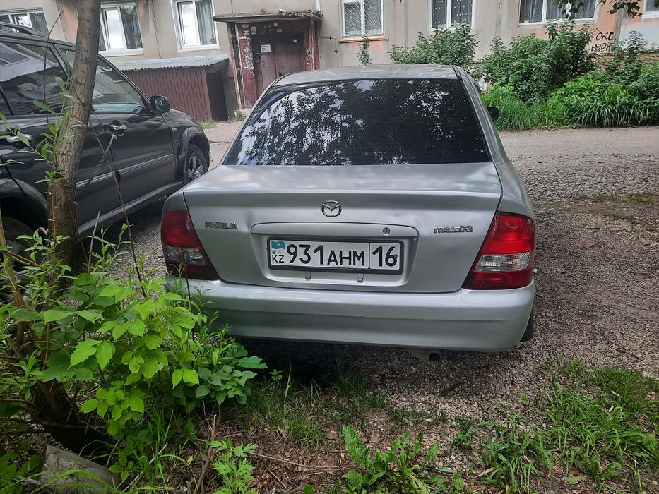 Машина мазда фамилия