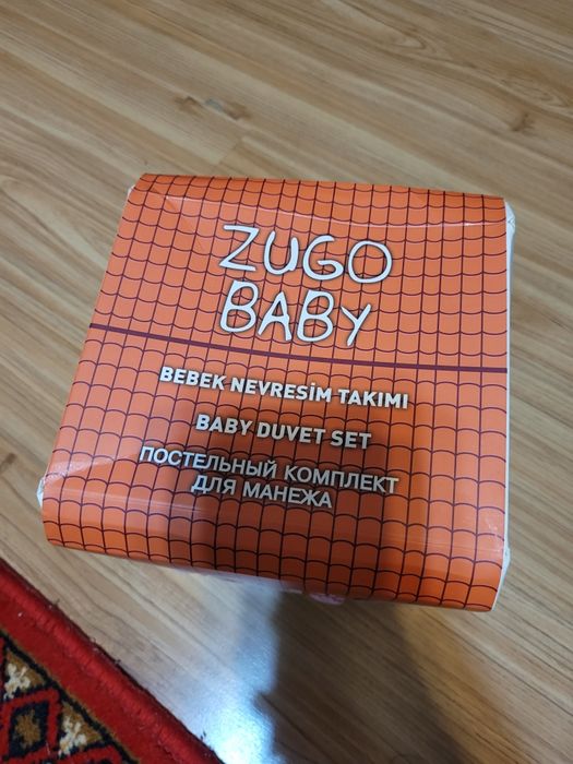 Продам постельный комплект для манежа