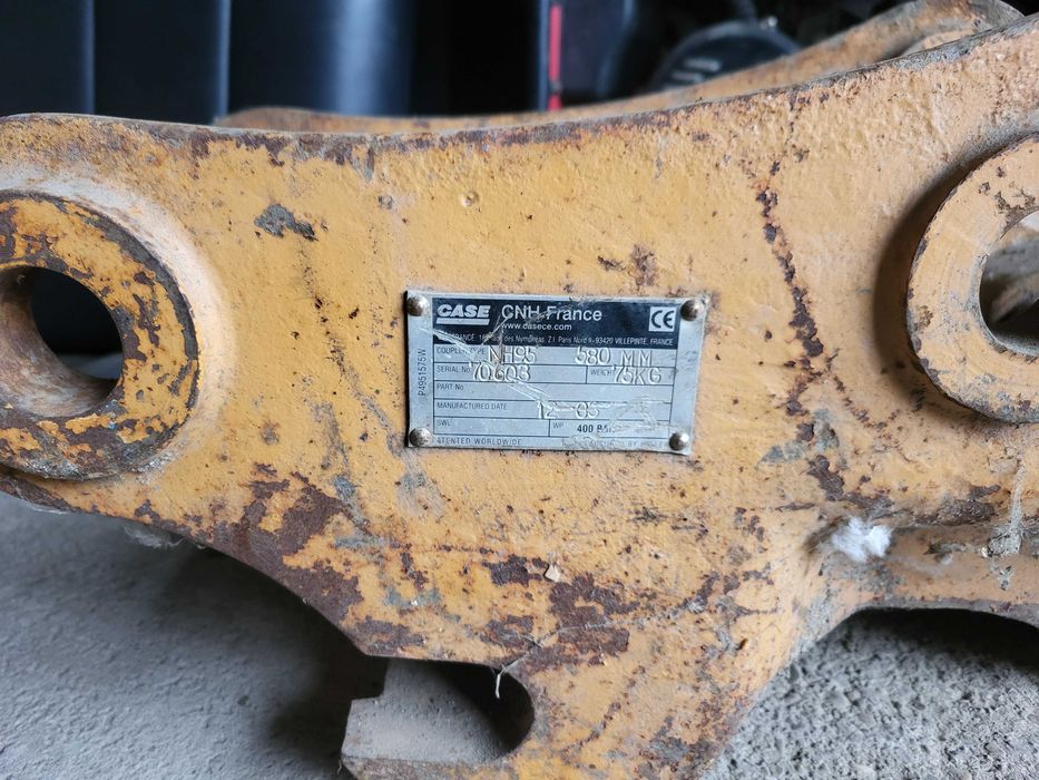 Механичен бързосменник за комбиниран багер CASE/NEW HOLLAND