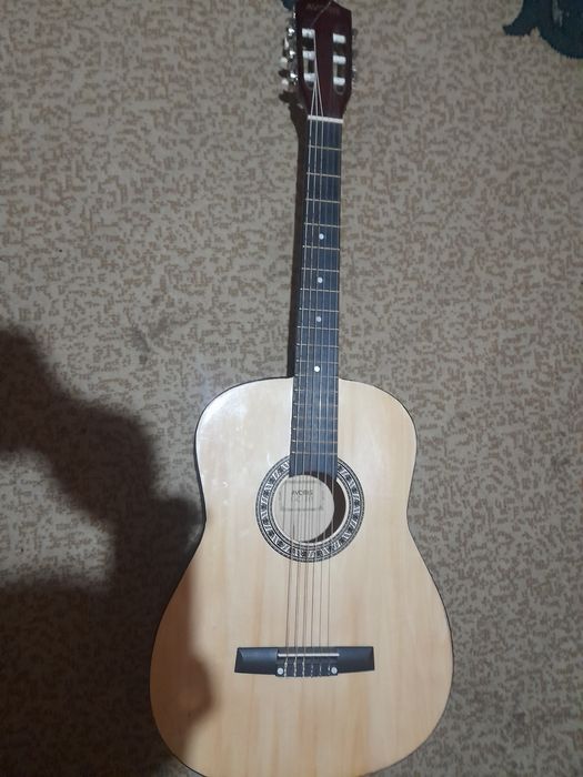 Gitara i bilan ifial xolatta