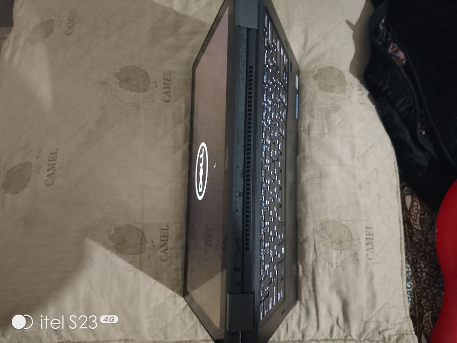 Dell 2 tasi birda noutbuk sotiladi ekran sensor