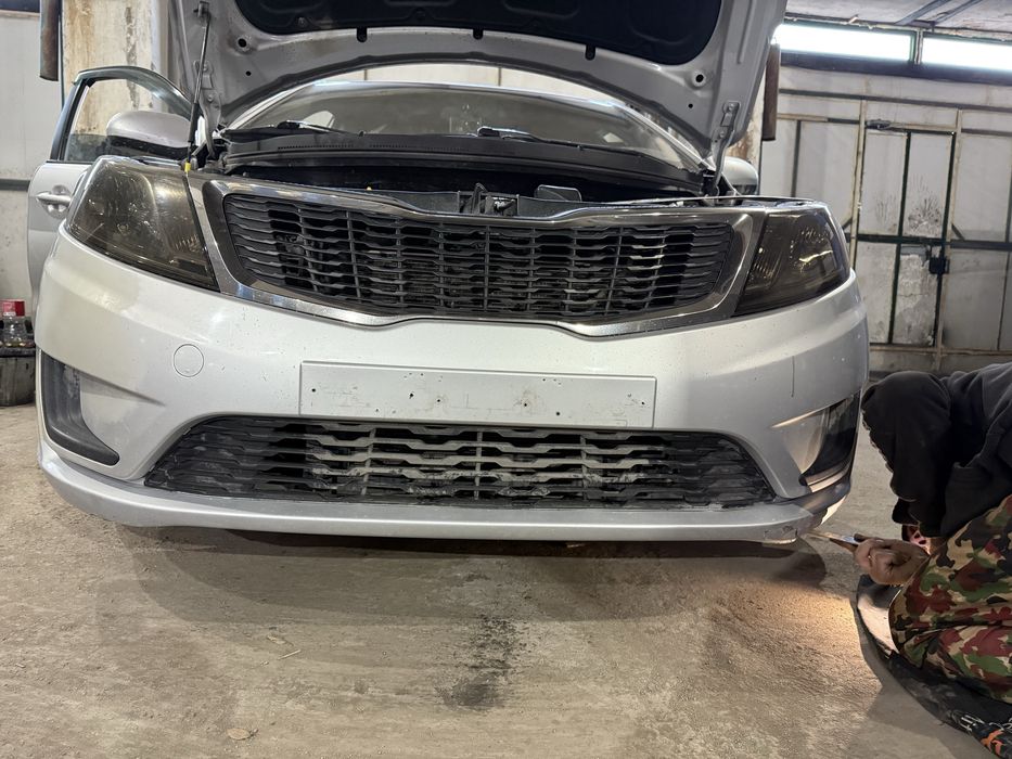Бампер на Kia Rio 2013