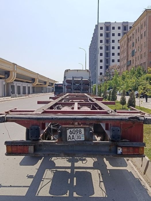 HOWO A6 + Контейнеровоз прицеп Сотилади