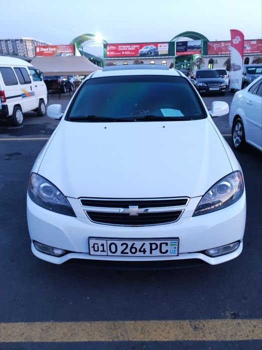 2023 Gentra Lasetti avtomat lyukli oq kraska toza