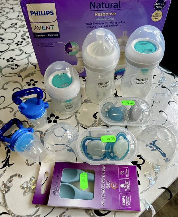 Saltea activitati  + perna  multifunctionarede + salopeta + biberoane