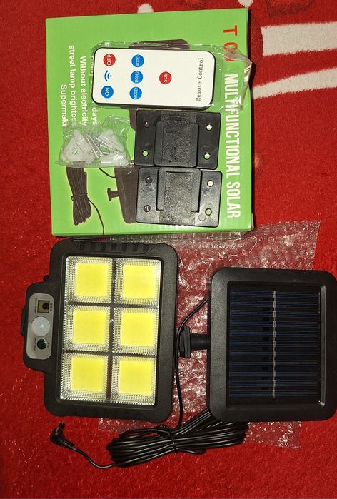 Set 2 bucăți lămpi solare cu fir si senzor de mișcare,  firul are o lungime de aproximativ 5 metri.