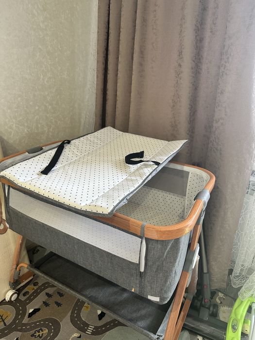 Манеж на колесиках