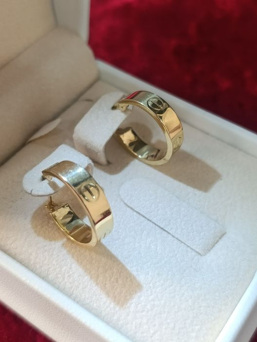 Золотые серьги CARTIER с кольцом, проба 585,вес 2,72,