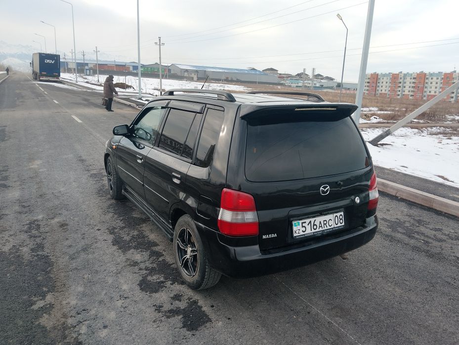 Mazda Demio 2003 г