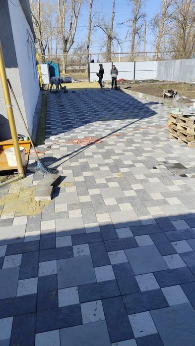 Укладка асфальта брусчатки