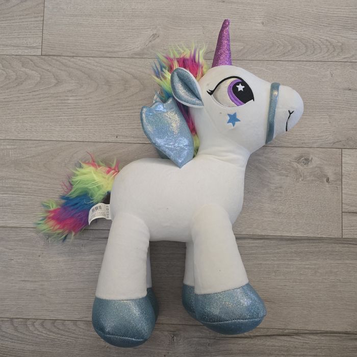Плюшена играчка еднорог. Нова. 45 см висока.